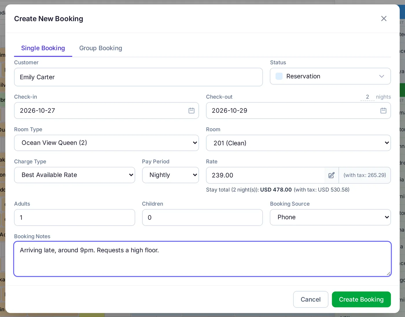 Create New Booking dialog filled in for Emily Carter: two nights in an Ocean View Queen room 201 on the Best Available Rate at 239 per night, booked by phone, with a note about late arrival